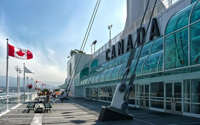 The Canadian flag is show flown at full-staff at Canada Place in Vancouver. This photo says, "Wow! They googled Vancouver," but no! We actually live here!